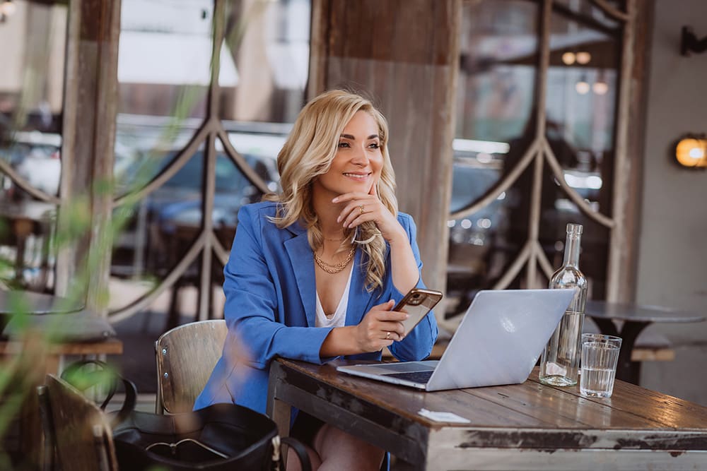 Business woman on her laptop reading about Chicago SEO