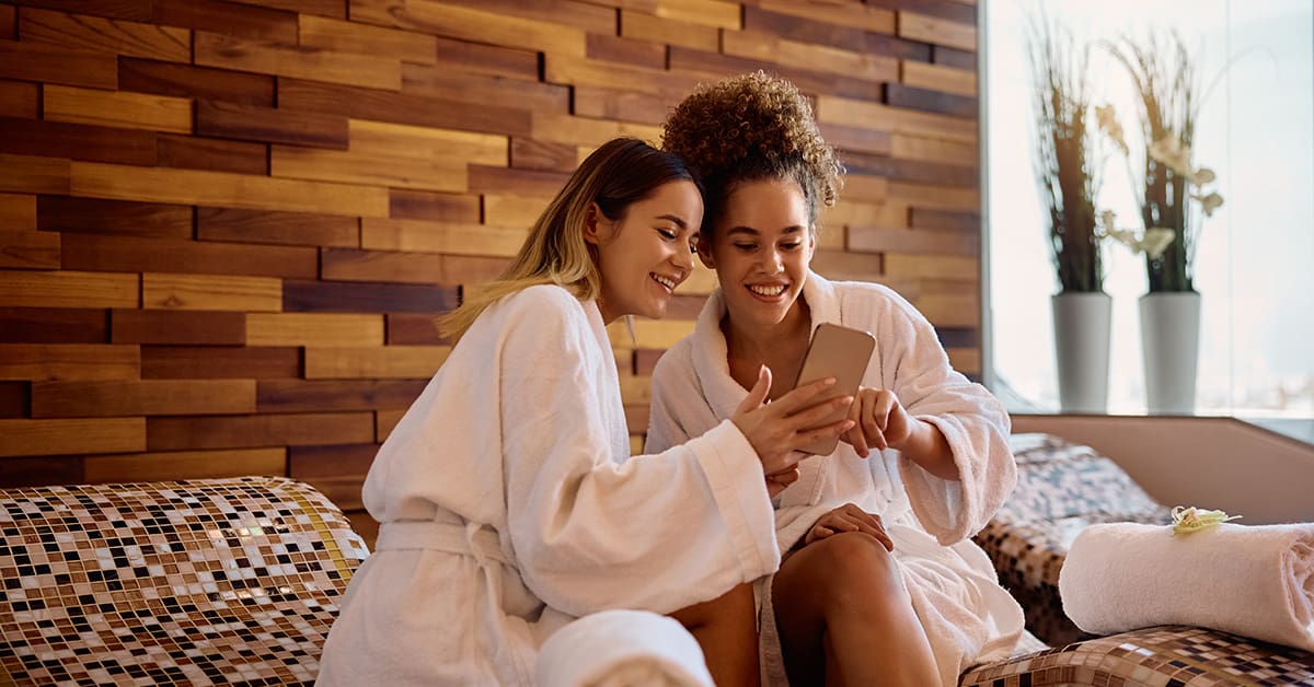 Medical spa social media marketing, two women at the spa on the phone